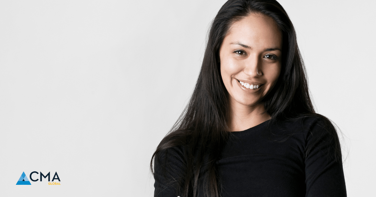 A professional Indigenous woman with long dark hair wearing a black top, smiling confidently against a plain white background, with the CMA Global logo in the bottom-left corner.